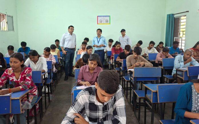 Students appearing for Polytechnic Entrance Examination at an exam centre in Bokaro